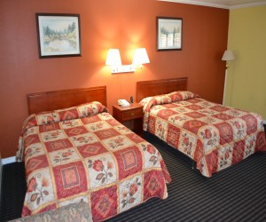 Double Queen Bedroom at Alpha Inn