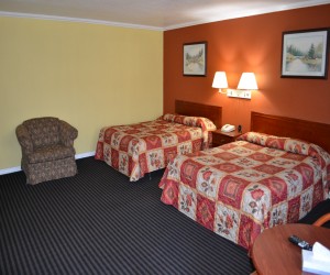 Double Queen Bedroom at Alpha Inn